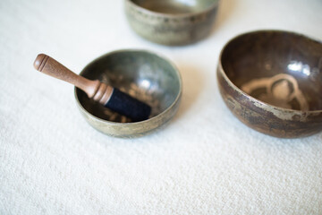 Singing bowls or Tibetan bowls and wooden mallet or stick for meditation, mindfulness, sound healing, relaxation. 