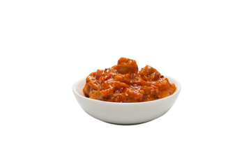 Vegetable stew in a bowl isolated on white background.