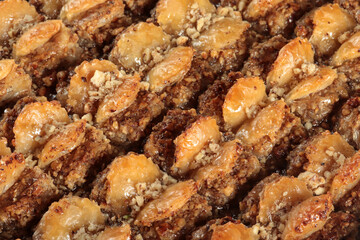 Traditional Turkish dessert Baklava. With walnuts and pistachios.