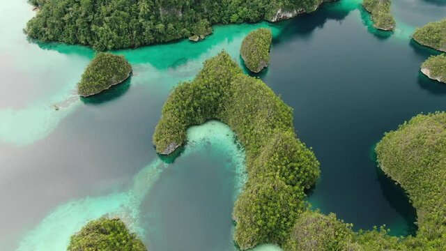Aerial View Of Triton Bay With Turquoise Sea And Green Tropical Trees In Kaimana Islands. Wide Angle Nature; Pacific Lagoon And Picturesque Landscape In Papua, Indonesia.