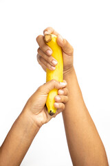 Banana peel aging in hand isolated on white background.