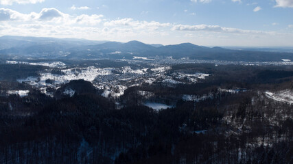 Forestpictures with snow in the Blackforest. The pictures is taken by a drone . It was sunny weather. The Horizon is beautiful. The location is Freiholsheim near Baden-Baden 