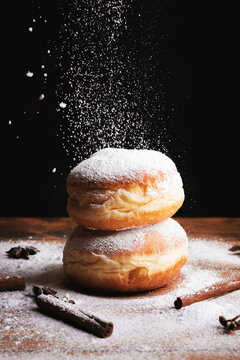 Donut with dropping powdered sugar
