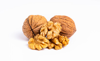 walnut and a cracked walnut isolated on the white background