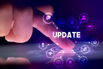 Finger touching tablet with web technology icons and UPDATE inscription, web technology concept