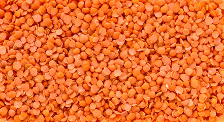 A spread of red lentils as a background