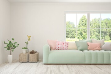 White living room with sofa and summer landscape in window. Scandinavian interior design. 3D illustration