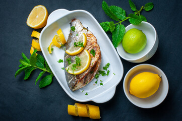 Whole bream with lemon and parsley