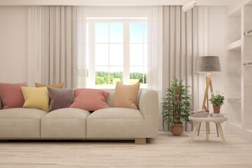 White living room with sofa and summer landscape in window. Scandinavian interior design. 3D illustration