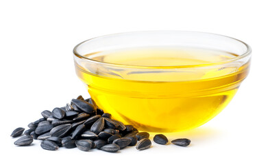 Sunflower oil in a glass bowl and sunflower seeds on a white background. Isolated