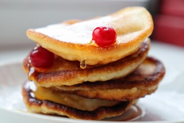 Honey pancakes with berries for breakfast