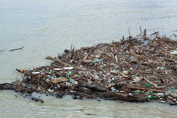 accumulated garbage and plastic waste on the river in Belgrade
