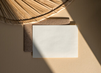 Blank uncoated paper card isolated on beige boho style background
