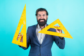 male student at mathematics school lesson. pass the math exam. learning the subject. cheerful man with beard using triangle. studying the measurement. formal education. Everyone Successful Everyday