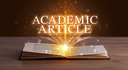 ACADEMIC ARTICLE inscription coming out from an open book, educational concept