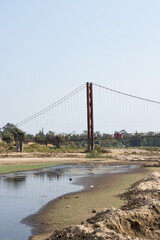 Red iron bridge with sky stock image.