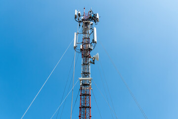 workers are working at 5g antenna tower for maintaining.serves cellular antenna, technician worker...