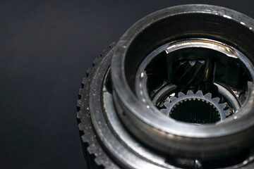 Planetary gear close up on dark background
