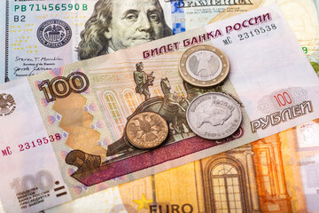 Dollars, euros, rubles and pounds lie on the surface