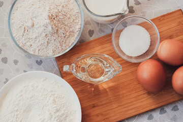 Cooking for someone special concept. Ingredients for homemade pancakes. Top view