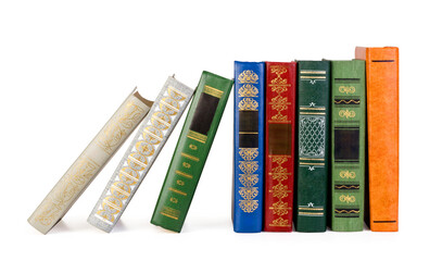 vintage books in a row, isolated on white background