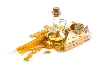 Italian food ingredients for making spaghetti pasta. Raw spaghetti with various ingredients. Isolate on a white background.
