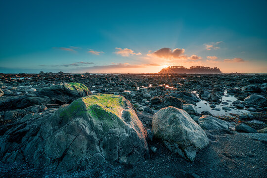 sunset over the sea at Cape Alava in Olympic National Park.