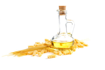 Oil in a glass jar. Raw pasta. Food on a white background.