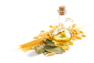 Oil in a glass jar. Raw pasta. Food on a white background.