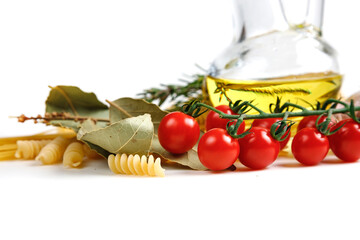 Italian food ingredients for making spaghetti pasta. Raw spaghetti with various ingredients. Isolate on a white background.