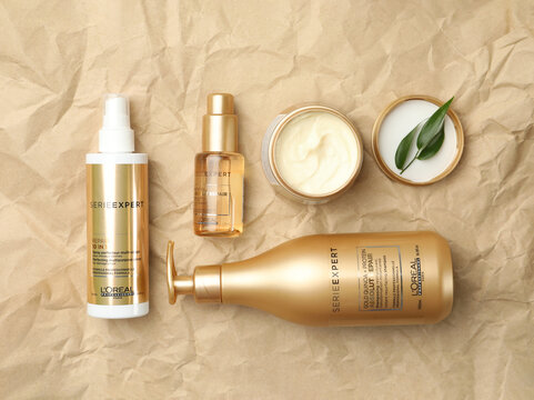 MYKOLAIV, UKRAINE - AUGUST 08, 2020: Flat lay composition with L'Oreal hair care cosmetic products on crumpled paper