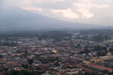 Aerial view of Antigua Guatemala colonial city at sunset on a cold day - small magical town