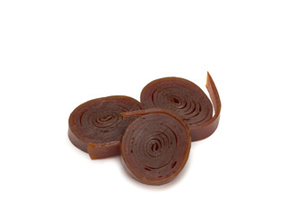 Fruit rolls pastille. Fruit candy rolls. Shredded and dried fruits.