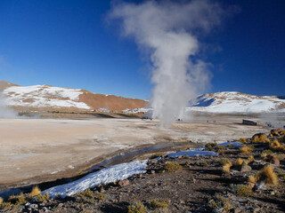 Geyser del Tatio, Atacama Desert, Chile : Geyser in the morning erupting activity in the Geysers del Tatio field in the Atacama Desert, Chile.