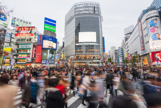 Tokyo, Japan - Janury 17, 2016: An abstract view of Commuters crossing one of the most famous crossings in Tokyo, the Shibuya crossing in Tokyo's shopping district.