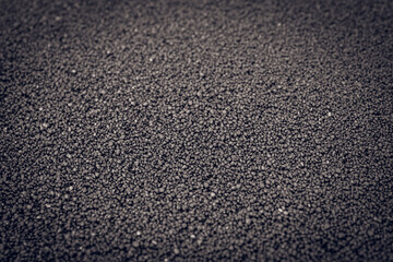 Smooth surface of fine black sand
