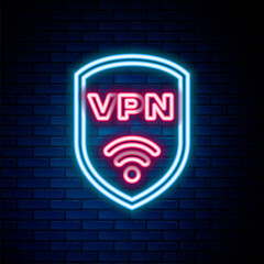 Glowing neon line Shield with VPN and wifi wireless internet network symbol icon isolated on brick wall background. VPN protect safety concept. Colorful outline concept. Vector.
