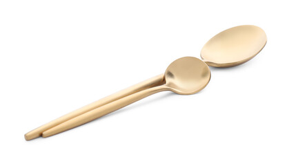 Elegant shiny golden spoons isolated on white