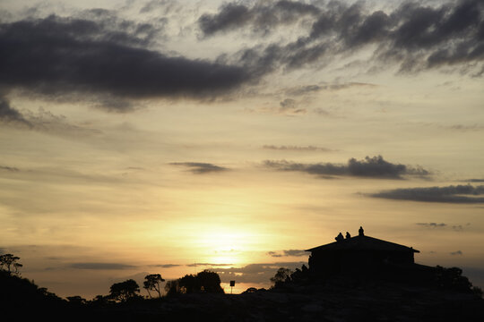 People Silhouettes at Sunrise in the Mountains in Brazil 