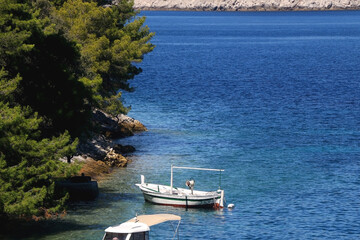 Fototapeta na wymiar Small fishing boats in the picturesque bay on island Lastovo, Croatia.