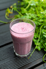 Berry smoothie with red berries and almond milk.