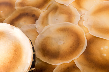 stack of pancakes on the frying pan, copy space