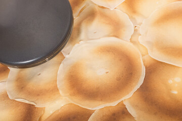 stack of pancakes on the frying pan, copy space