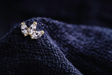 Beautiful piercing jewelry. Macro shot. Selective focus.