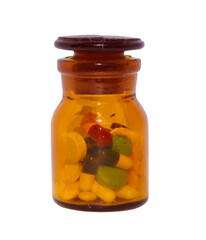old orange glass jar with pills.