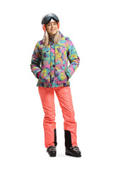 Full length portrait of a female with a helmet and skiing equipment