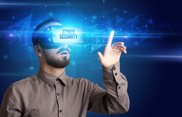 Businessman looking through Virtual Reality glasses with CYBER SECURITY inscription, cyber security concept