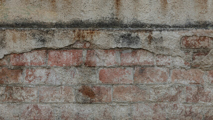Detail of a portion of an old brick wall