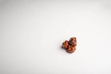 Popcorn with chocolate flavor isolated on white background