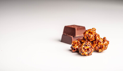 Popcorn with chocolate flavor isolated on white background 